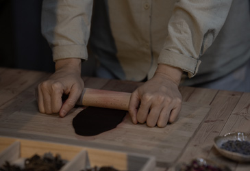 Kneading incense material.