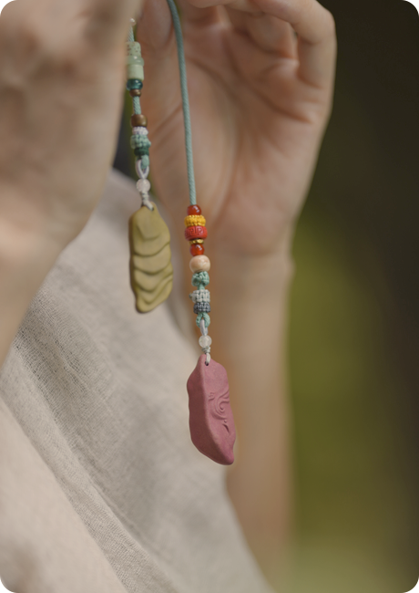 Necklace styled in quiet daily wear.